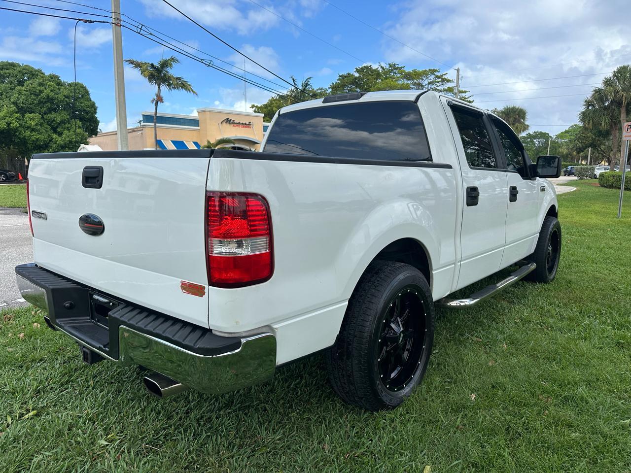 Ford F-1502Wd Supercrew 139" Lariat - Thumbnail 6