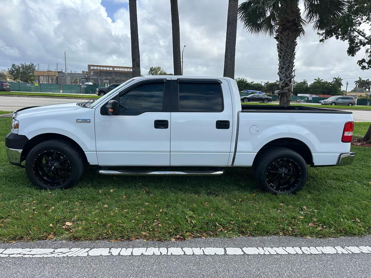 Ford F-1502Wd Supercrew 139" Lariat - Thumbnail 9